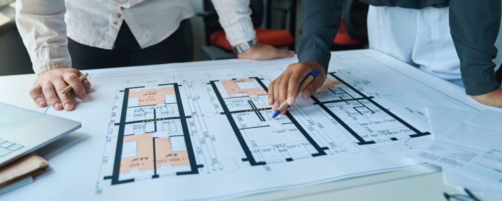 Architect working on residential project plans